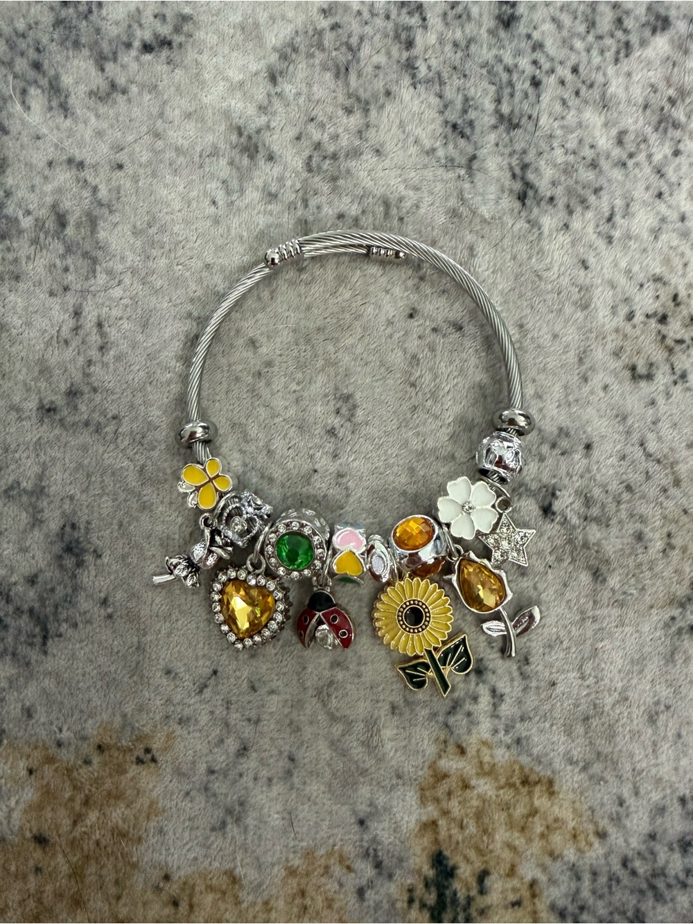 Silver Floral Charm Bracelet with Yellow Accents